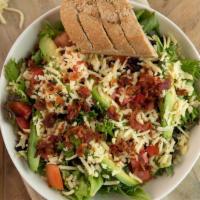 #24 American Field Greens Salad · Cheddar, tomatoes, avocado, bacon, honey-tarragon vinaigrette, and fresh bread.