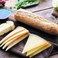 Three Cheeses · Your choice of cheese with bread, fruit and accompaniments.