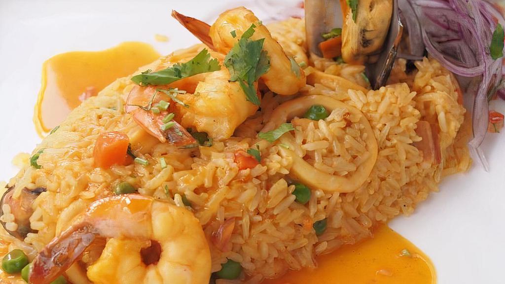 Arroz Con Mariscos · Mixed seafood octopus, calamari, shrimp, and mussels are prepared with the chef's Brava recipe.