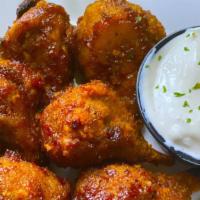 Hot Vings · House made Vegan wings baked with your choice of sauce
