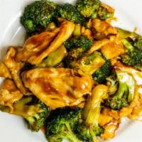 Broccoli Chicken · Stir fry of meat with onions and broccoli in a light sauce.