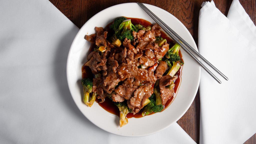 Broccoli Beef · Stir fry of meat with onions and broccoli in a light sauce.