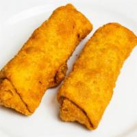 Egg Rolls (2 Pieces) · House made light and crispy pork egg rolls. Served with our House Sweet and Sour sauce