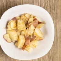 Breakfast Potatoes · Seasoned red potatoes cooked with peppers