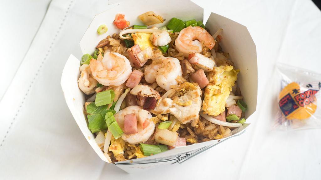 Super Fried Rice · Shrimp, pork, chicken, ham, and crab meat. All the fried rice have bean sprouts, onion, green onion, and egg.