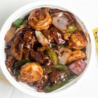 Beef & Shrimp With Chili Pepper · 36 oz. tender slices of beef and jumbo shrimp sauteed with onion, green and red pepper in an...