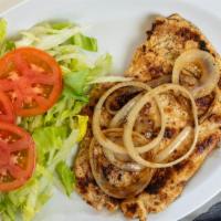 Filete De Pollo (Chicken Fillet) · Flattened chicken breast marinated cuban style. Cooked until golden and topped with sauteed ...