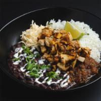 Pollo Asado Bowl · cilantro-lime rice, frijoles negros, tangy achiote-rubbed grilled chicken, salsa, cheese, cu...