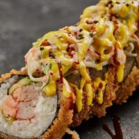 Miami Sushi Roll · Nori, tuna, salmon, kani stick, cream cheese, scallion, crab salad, honey-based sauce.