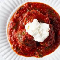 Meatballs · Two signature beef and turkey meatballs, braised in a tomato basil sauce, served with ricott...