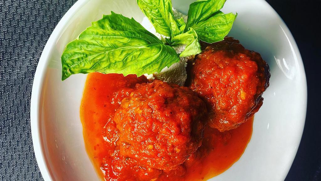 Italian Meatballs · 100% beef meatballs cooked in tomato sauce and ricotta cheese.