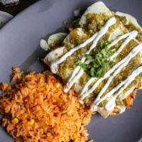 Enchiladas · Three corn enchiladas stuffed with choice of filling, sauced with queso dip and salsa Verde....