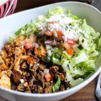 Santa Fe · Bed of Mexican rice with choice of filling and black beans, lettuce, pico, guacamole, sour c...
