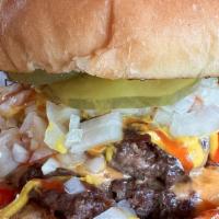 Double Cheese Burger · Two smashed beef patties, melted american cheese, chopped onion, pickles, mustard and ketchu...