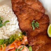 Milanesa Chicken · Deep fried breaded chicken thigh served with two sides.