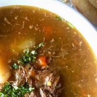 Sopa De Res With Arepa · Beef soup served with arepa