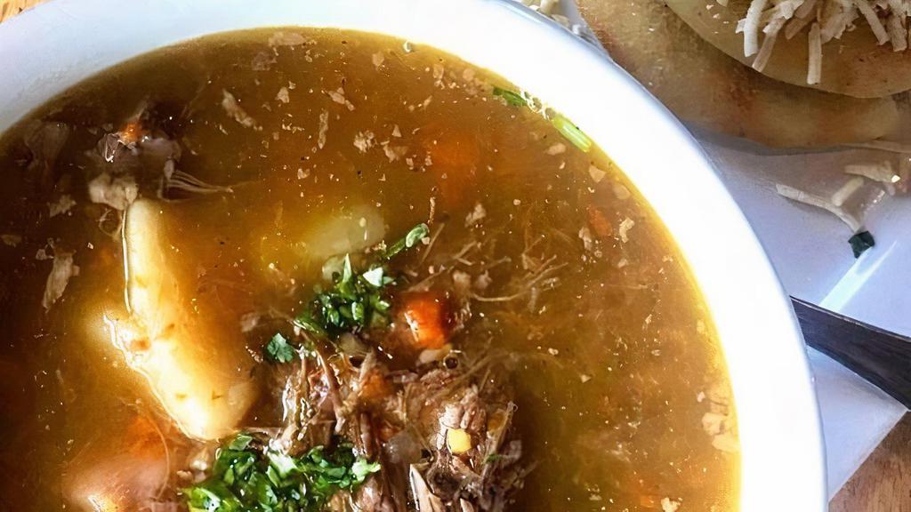 Sopa De Res With Arepa · Beef soup served with arepa