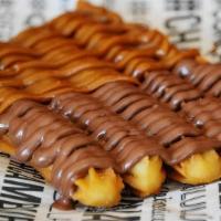 Churros Mixtos · Served with Nutella® and dulce de leche