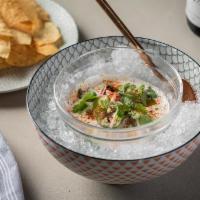 Coconut Ceviche* · PINEAPPLE, JALAPENO, CILANTRO, CUCUMBER, LIME, SERVED WITH TORTILLA CHIPS *item cannot be mo...