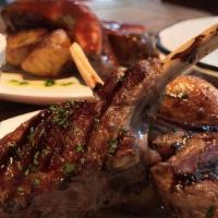 Agnello	 · New Zealand Lamb Chops, (Served with Rosemary Parmesan Fries & House Salad )