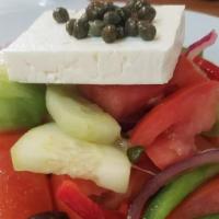 Greek Salad · Tomatoes, cucumbers, bell peppers, red onions, kalamata olives, capers, feta cheese, extra v...