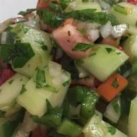 Shepherd Salad · Tomatoes, cucumbers, bell peppers, parsley, onions, extra virgin olive oil & red wine vinegar.