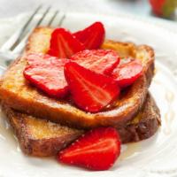 Nutella & Strawberry French Toast · 4 delicious slices of golden French Toast. Topped with Nutella, strawberries, a little butte...
