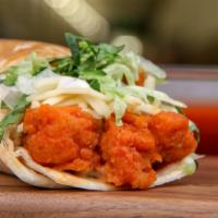 Buffalo Chicken Wrap · With Buffalo sauce, pepper and Jack, lettuce and ranch.