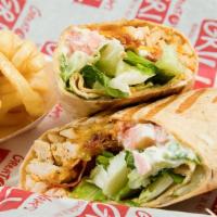 Santa Fe Chicken Wrap · Grilled chicken, bacon, Cheddar cheese, lettuce, tomatoes, and creamy Feta sauce in tomato b...