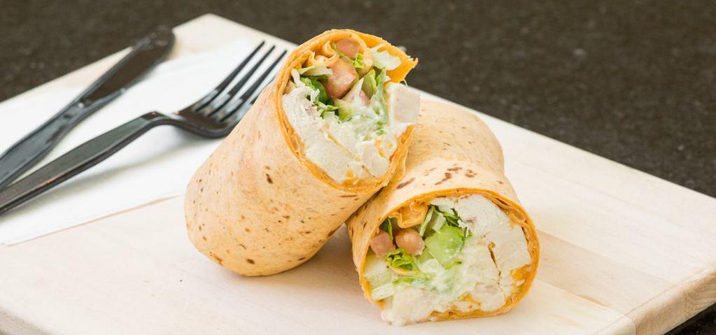 Chicken Caesar Wrap · Grilled chicken, Parmesan cheese, croutons lettuce, and caesar dressing in a wheat tortilla.