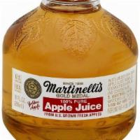Martinelli'S Apple Juice · Martinelli's apple juice in a glass bottle.
