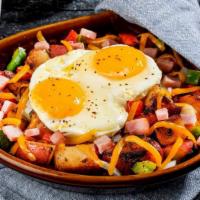 Skillet · Seasoned home fries, sauteed with peppers, and onions. Topped with a choice of cheese and 2 ...