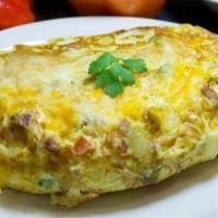Greek Omelette · Tomatoes, fresh spinach, and feta cheese. Served with pancake or toast.