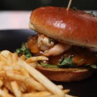 Surf & Turf Burger · Signature caper remoulade, marinated ground beef, cheddar cheese, arugula, and 3 jumbo grill...