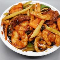 Szechuan Triple Crown · Spicy. Beef, chicken, shrimp, vegetable, snow peas, baby corn, bamboo shoots, and red pepper...