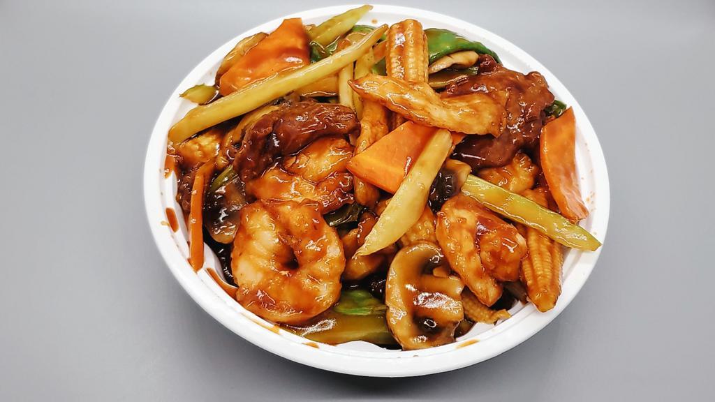 Triple Delight · Hot. Chicken, jumbo shrimp & beef sauteed in brown sauce With veg.