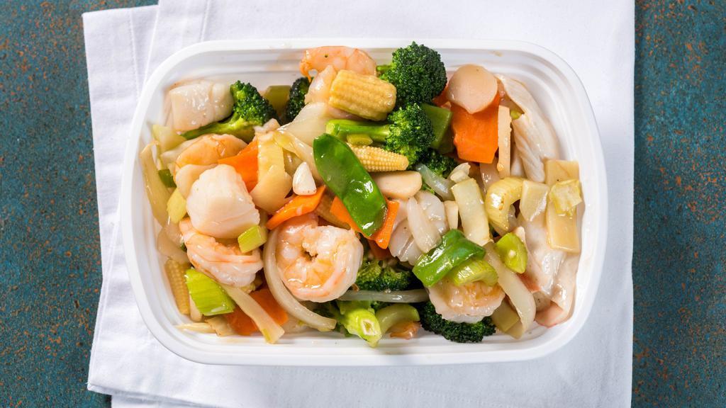 Seafood Delight · Jumbo shrimp, fresh scallops, crab meat with straw mushrooms, snow peas, baby corn, bamboo shoots, chestnuts and broccoli in cantonese sauce.