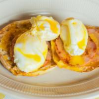 Eggs Benny · Three Poached Eggs over Canadian Bacon, Toasted English topped with Hollandaise Sauce