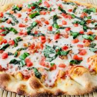 Tomato Basil Pizza · Tangy plum tomato sauce, melted mozzarella cheese, fresh diced tomatoes, garden grown basil ...