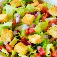 Garden Salad · Mixed greens, diced Roma tomatoes, sweet red onions, and shredded carrots. Served with a sid...