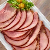 1Lbs Sliced Ham Bogo · Two pounds of our world-famous Honey Baked Ham, cut straight off the bone for you. Our slice...