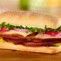 Ham & Turkey Bella Sandwich · Toasted. Ham, smoked turkey breast, Swiss cheese, lettuce, tomato, banana pepper rings, red ...