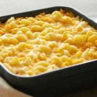 Double Cheddar Macaroni & Cheese · Heat and Serve Sides come frozen and can be baked or microwaved.
