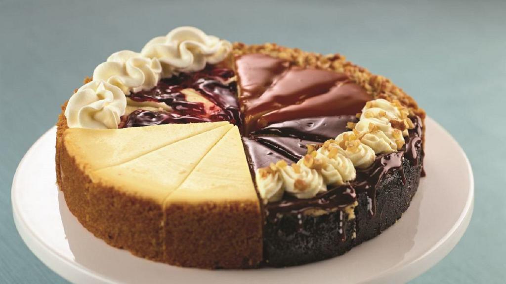 Cheesecake Sampler · Four of our rich and creamy New York Style Cheesecake flavors in one delicious cake:Hot Fudge, Strawberry Swirl, Turtle, and our Traditional Vanilla.
Serves 12