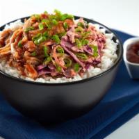 Low & Slow Bbq Pulled Pork Rice Bowl · American BBQ Classic: BBQ pulled pork with jasmine rice, spicy cole slaw & scallions.