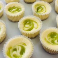 Marbled Key Lime Cheesecake Minis - 4Ct · Sweet yet tart. Fresh key lime curd in our Key lime flavored cheesecake. Baked on our  from-...