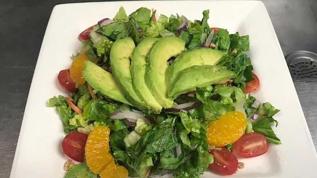 Avacodao Salad · Field greens, cucumber, cherry tomato, mandarin oranges, sunflower seeds, 1/2 avocado, garlic cider vinaigrette. GF V