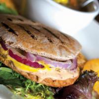 Mediterranean Vegan Veggie Burger · Vegan. Whole grain & veggie burger on wheat pita w/ hummus, mustard, lettuce & onions.