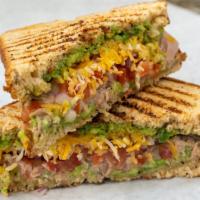 Tuna Sandwich · Avocado, tuna, american cheese and pico de gallo in a whole wheat bread pressed on the grill