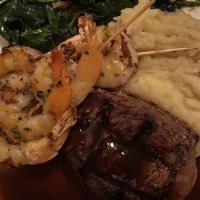 Beef And Reef · 8oz Marinated Certified Angus Beef Tenderloin, 5 Shrimp, Wilted Spinach, Garlic Mashed and D...